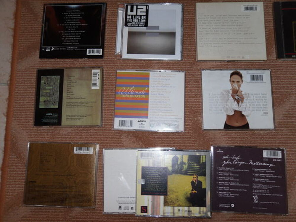 Divers CDS : AC-DC, U2, J. Lopez, S.McLachlin TBE CD et vinyles