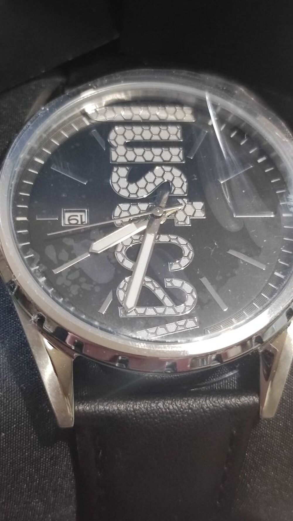 Montre mixte acier inoxydable et bracelet cuir. Just Cavalli Bijoux et montres