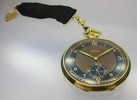 MONTRE GOUSSET SUISSE DOXA EN OR 18 KT 1250 Strasbourg (67)