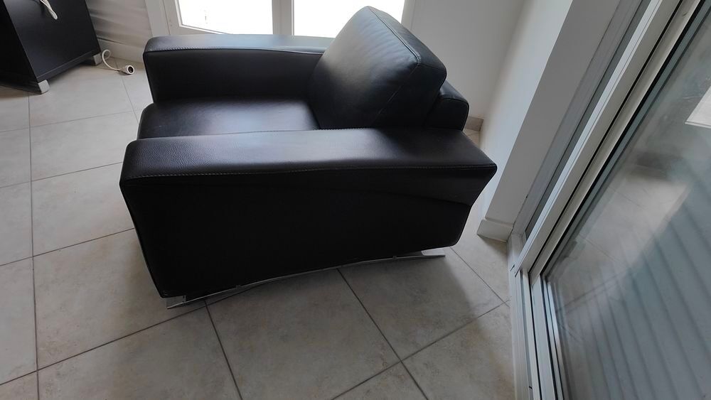 Fauteuil noir cuir Roche Bobois Meubles