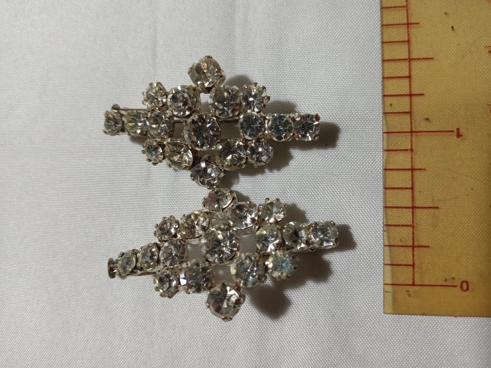 Paire de broches zirconium Bijoux et montres