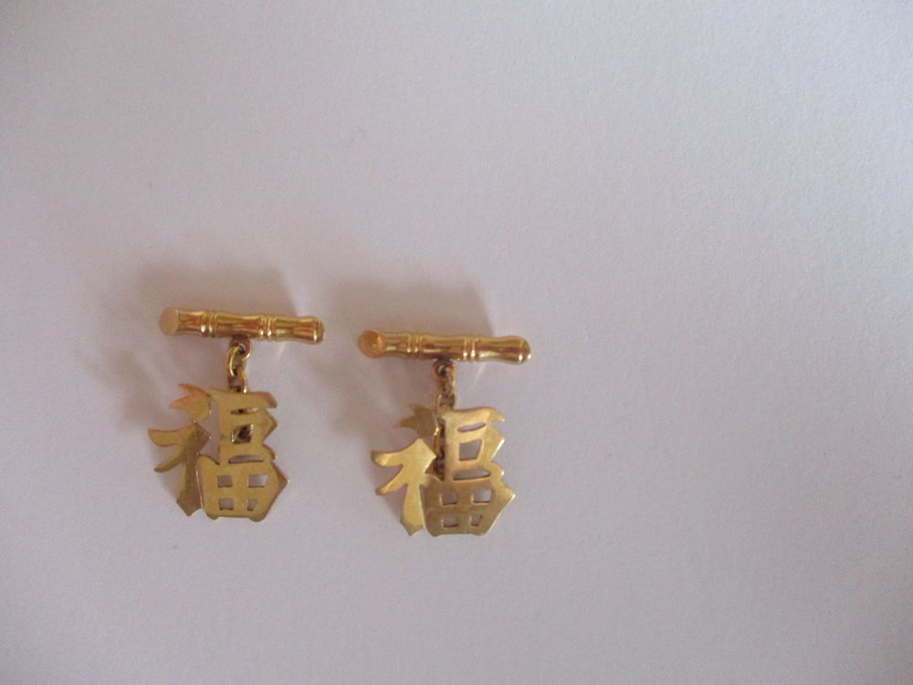 boutons de manchette en or Bijoux et montres