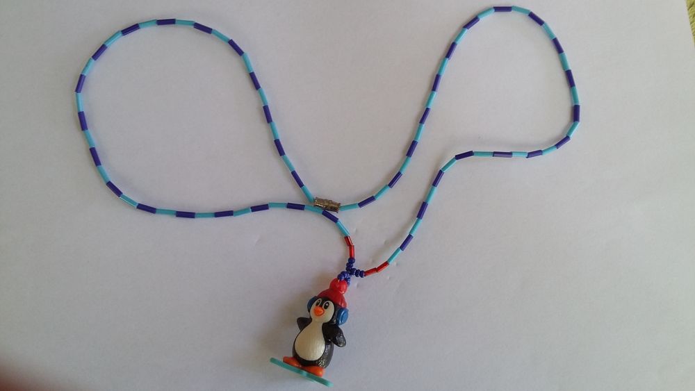 Pendentif , collier avec un pingouin Bijoux et montres