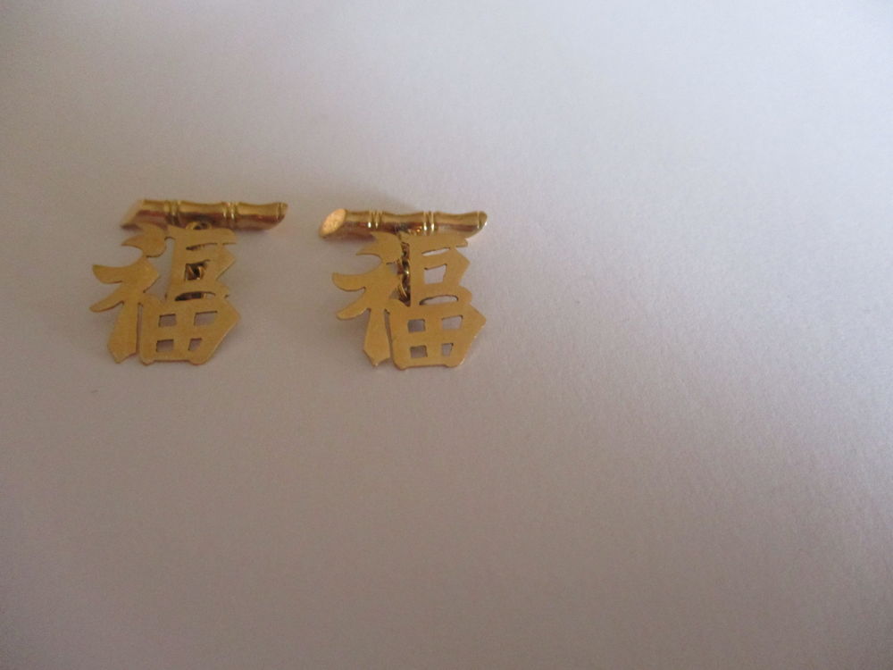 boutons de manchette en or Bijoux et montres