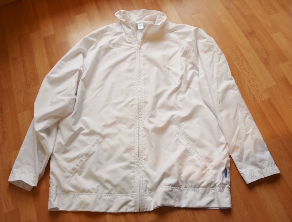 Blouson fin blanc. 40. Decathlon. Tr&egrave;s bon &eacute;tat. Vtements