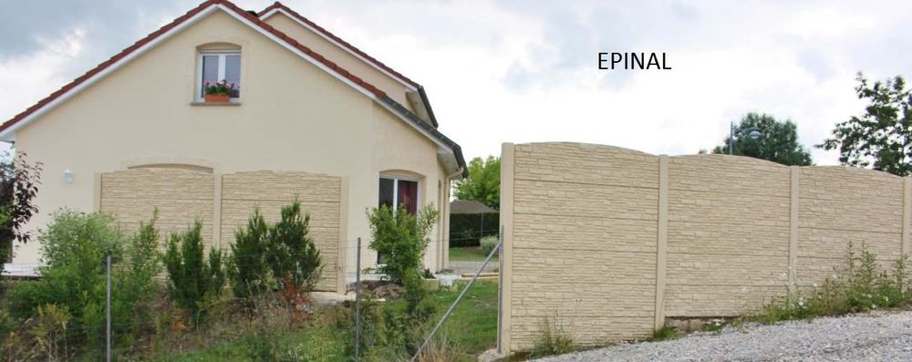 Une cl&ocirc;ture en b&eacute;ton d&eacute;co. Jardin