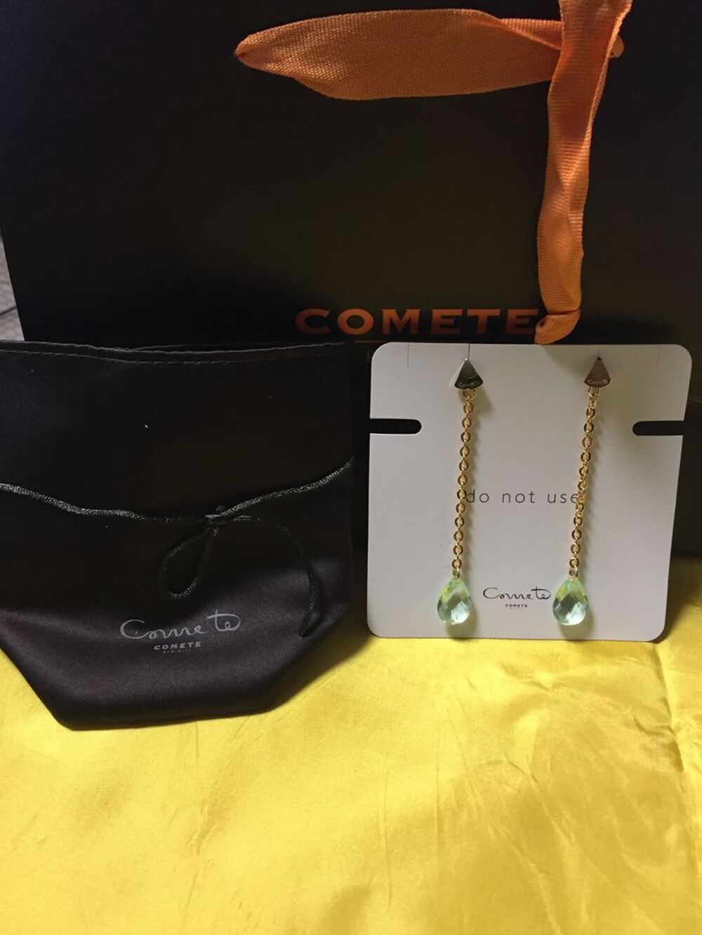 boucle d'oreille marque com&egrave;te UORM 133 Bijoux et montres