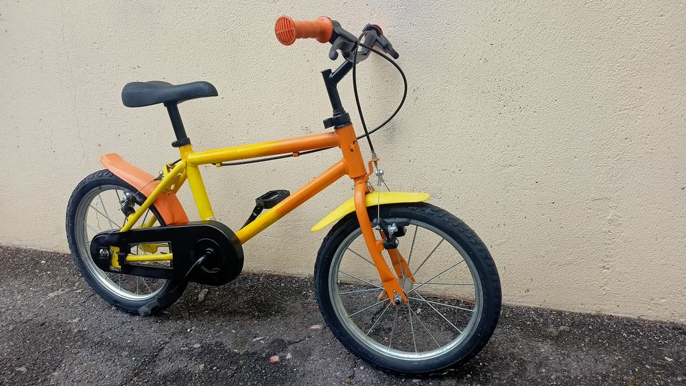 velo 16 pouces jaune orange 
Vélos