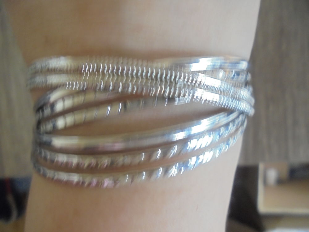 8 joncs entrelac&eacute;s (28b) Bijoux et montres