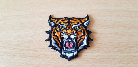 Ecusson brod� 
Petite t�te de tigre 
mod�le 1
4 Carnon Plage (34)