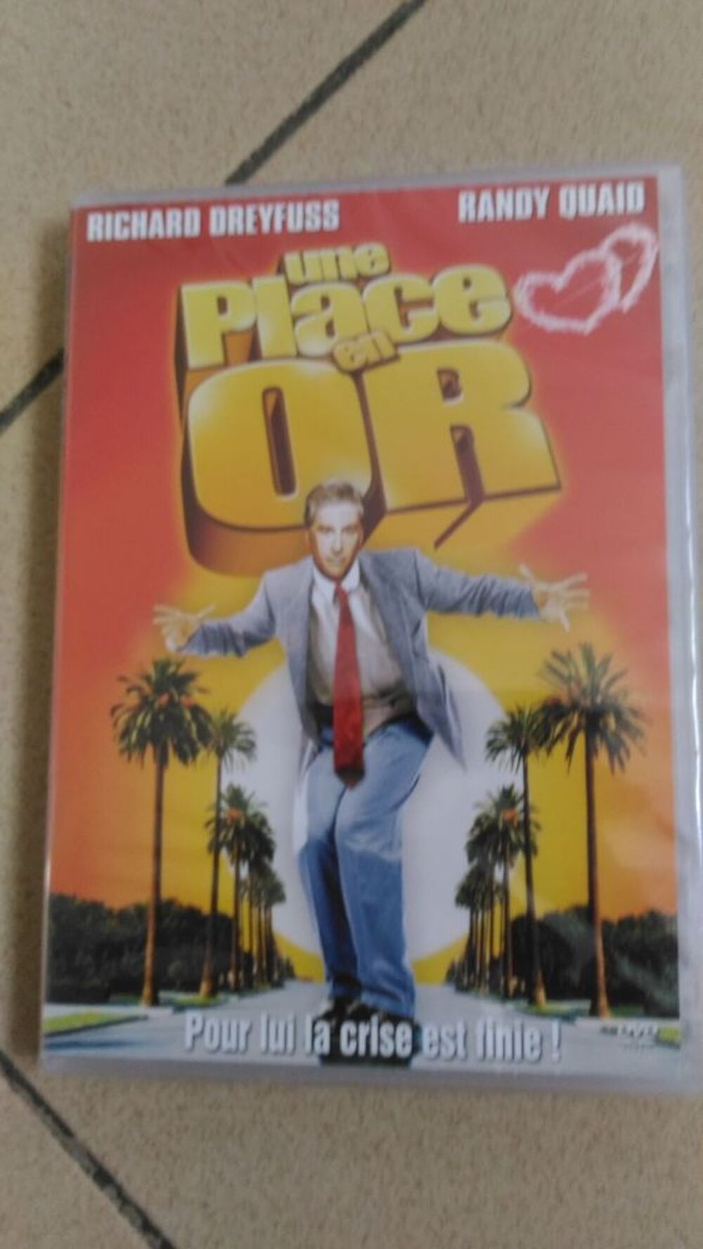 DVD UNE PLACE EN OR DVD et blu-ray