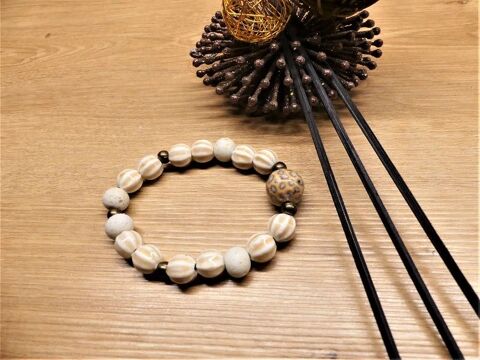 Bracelet élastique céramique et coquillage
5 Viroflay (78)
