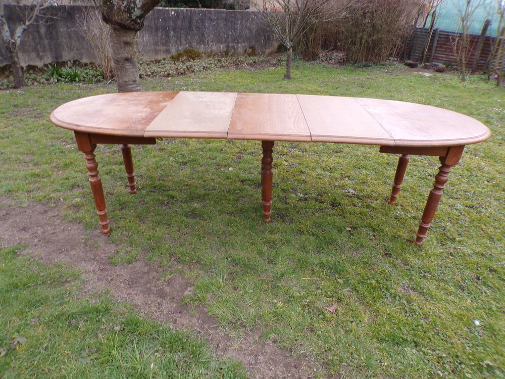 table chene massif extensible.
Meubles
