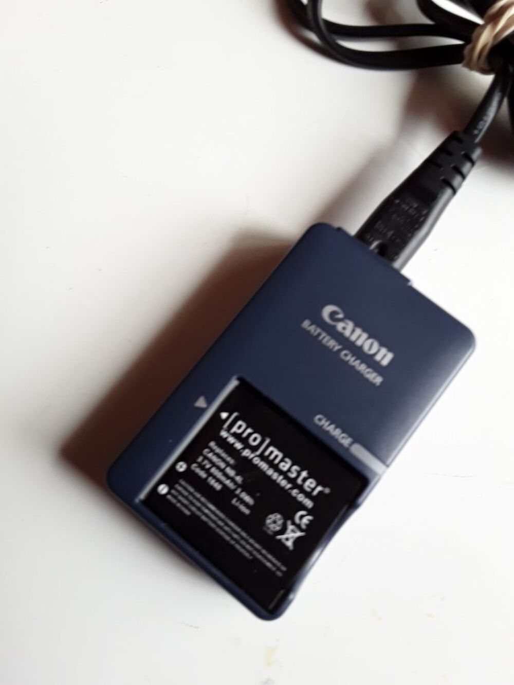 chargeur batterie canon +batterie promaster Photos/Video/TV