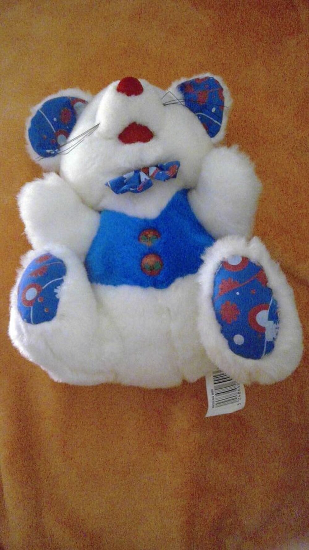 PELUCHE N&deg; 12
SOURIS BLANCHE BOUTONS ROUGE
Jeux / jouets