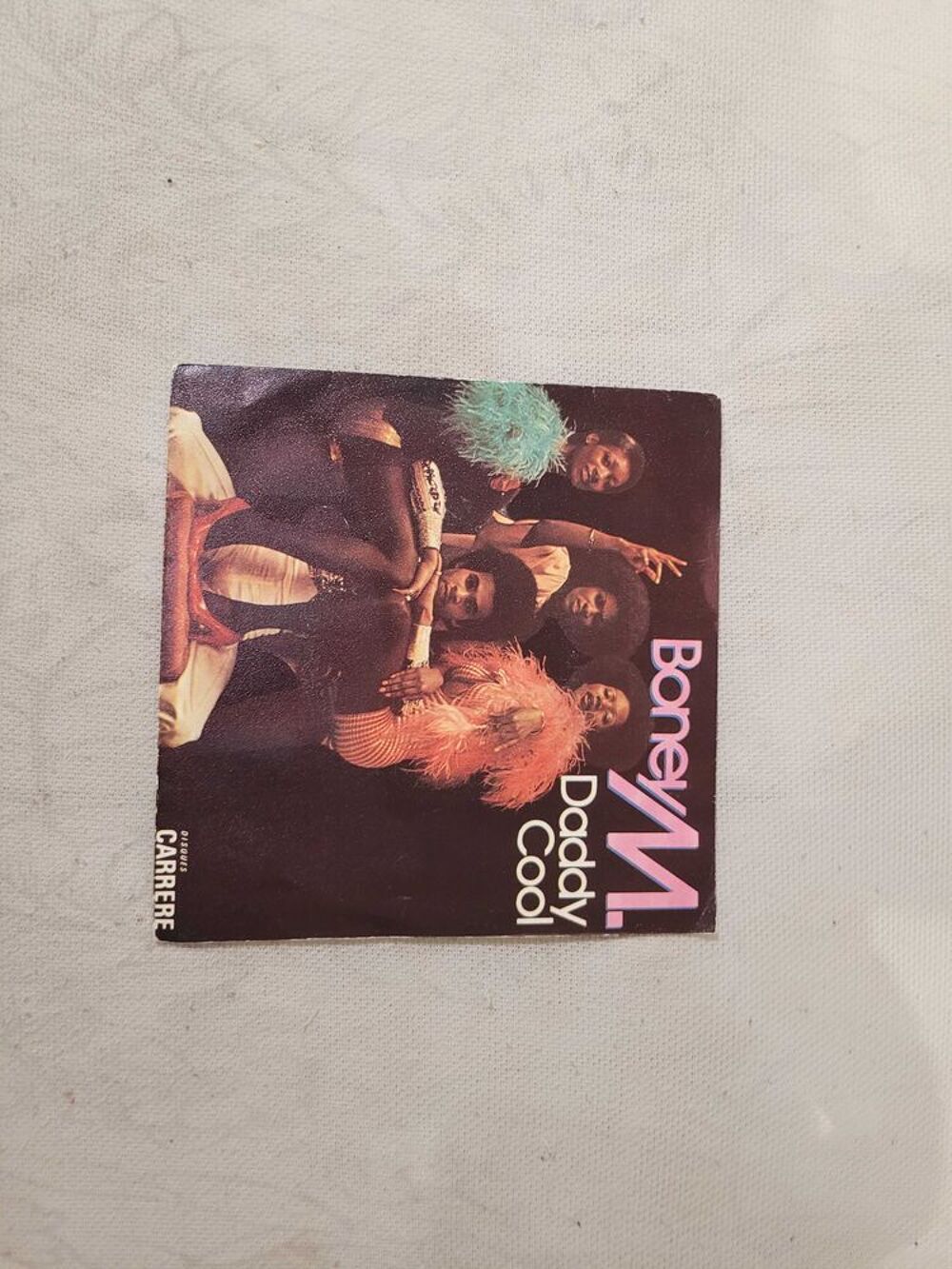 1 disque vinyl 45 tours CD et vinyles