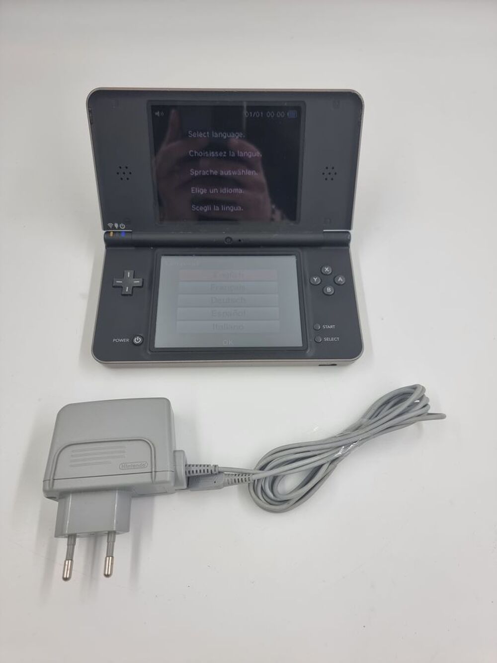 Console Nintendo DSi XL chocolat avec chargeur... Consoles et jeux vidéos