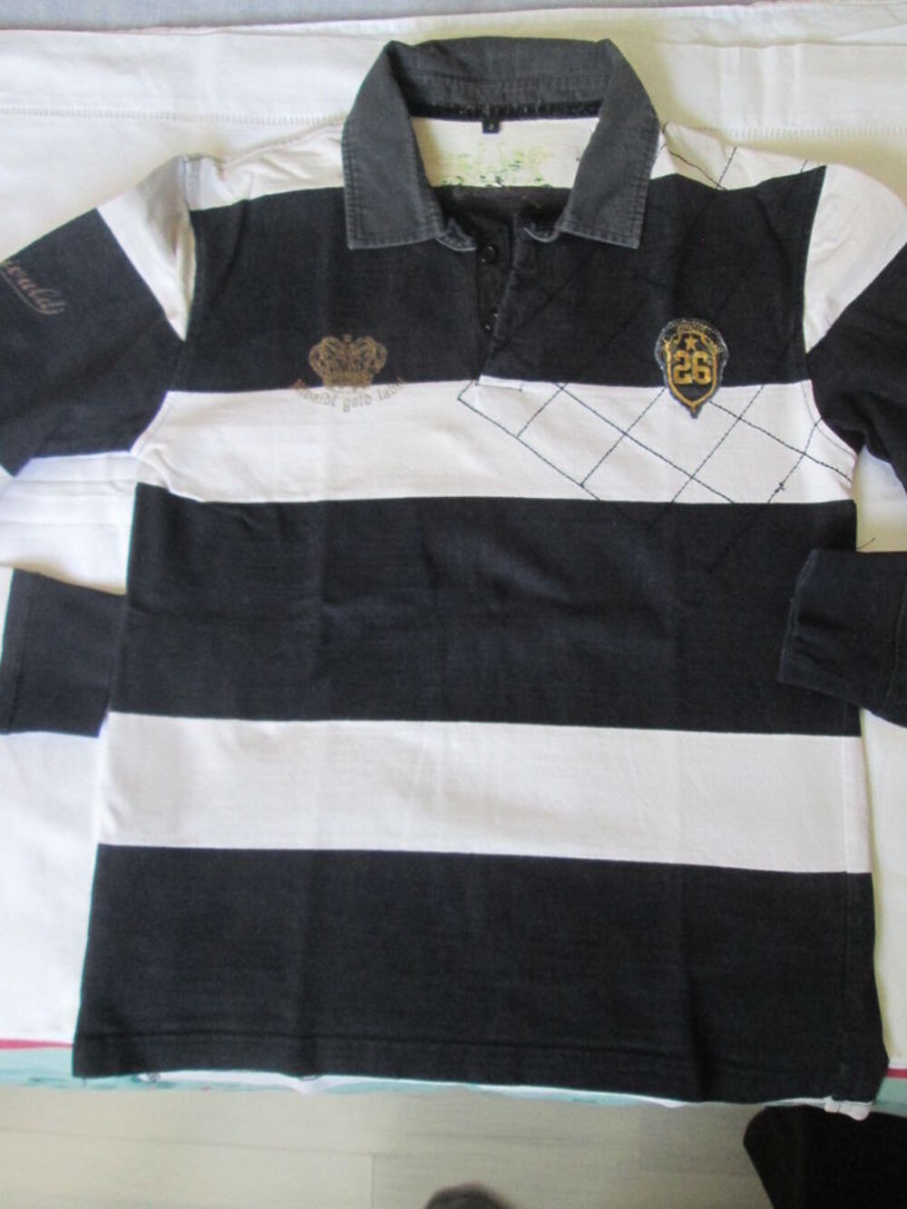 Polo manches longues &agrave; rayures noir et blanc taille S Vêtements