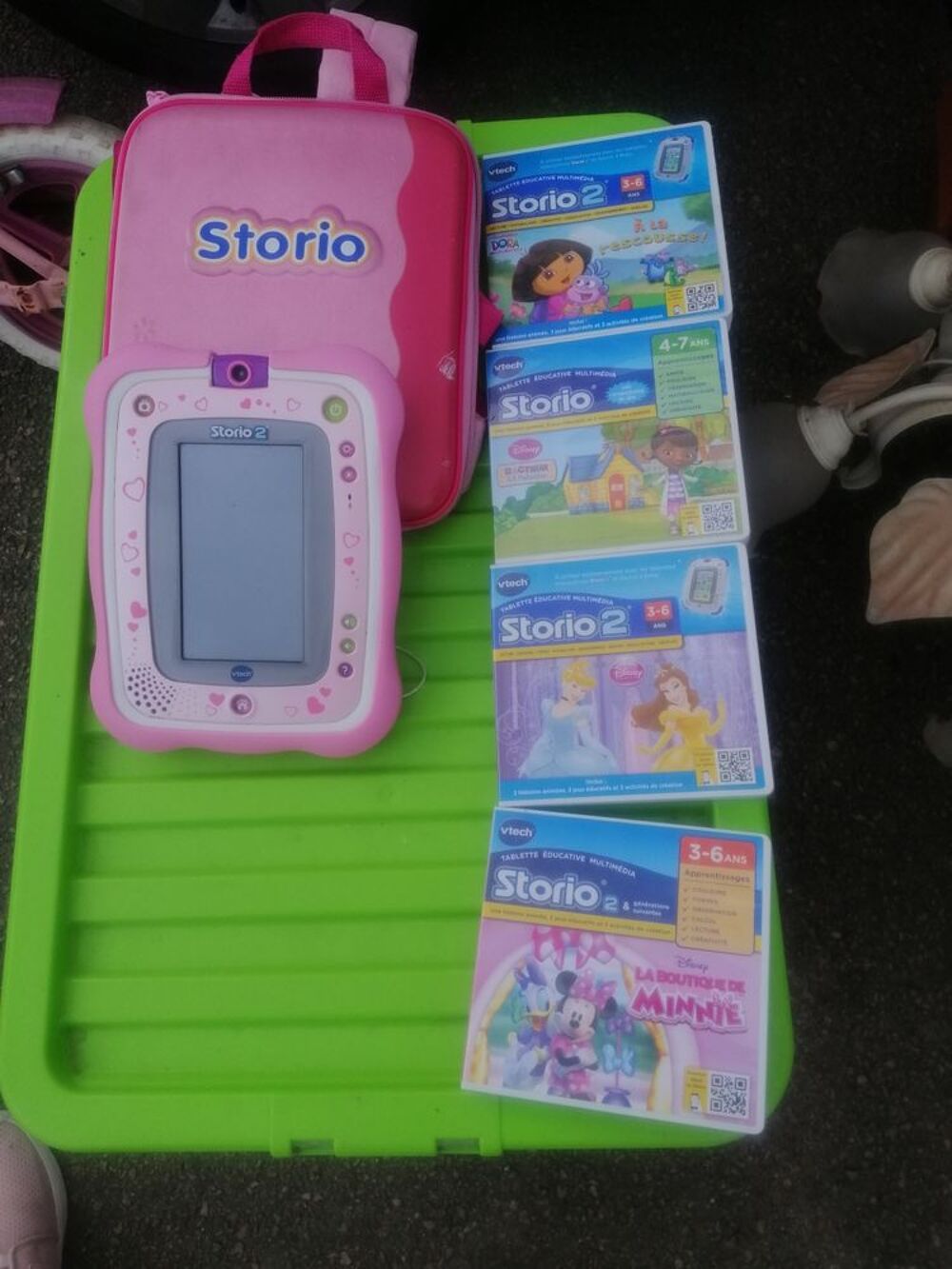 Storio 2 fille avec 4 jeux et sa pochette de rangement Consoles et jeux vidéos