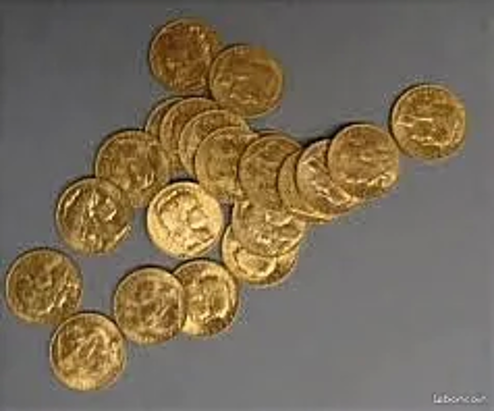 Bijoux et monnaies en or. 
Bijoux et montres