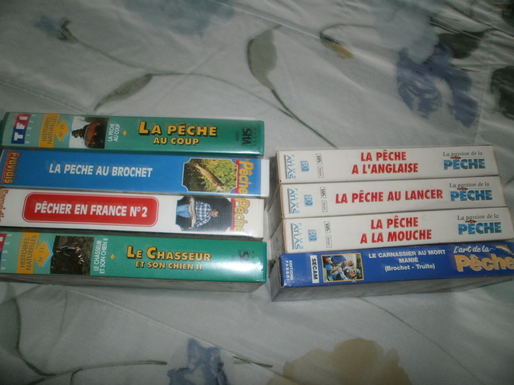 lot de cassettes vid&eacute;o sur la peche Photos/Video/TV
