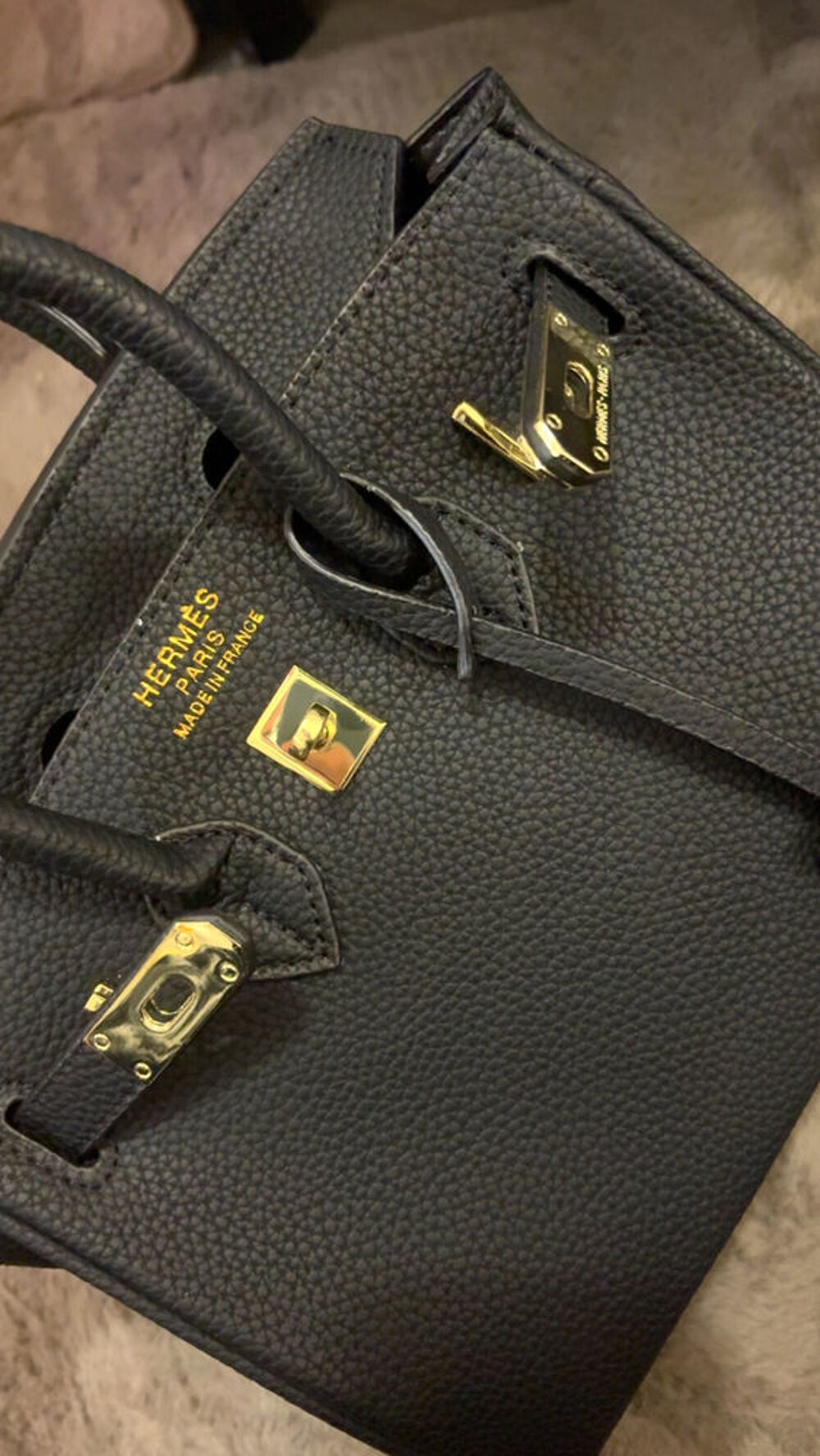 Sac noir et or Maroquinerie
