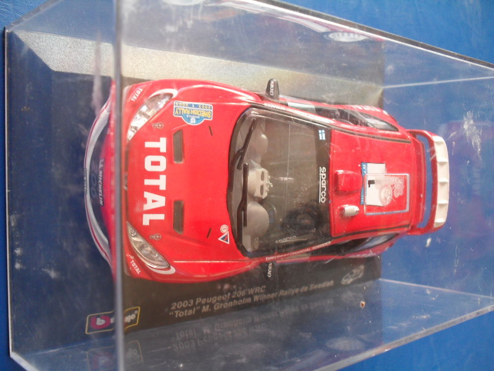 Voiture de collection burago rallye Peugeot 206 WRC 