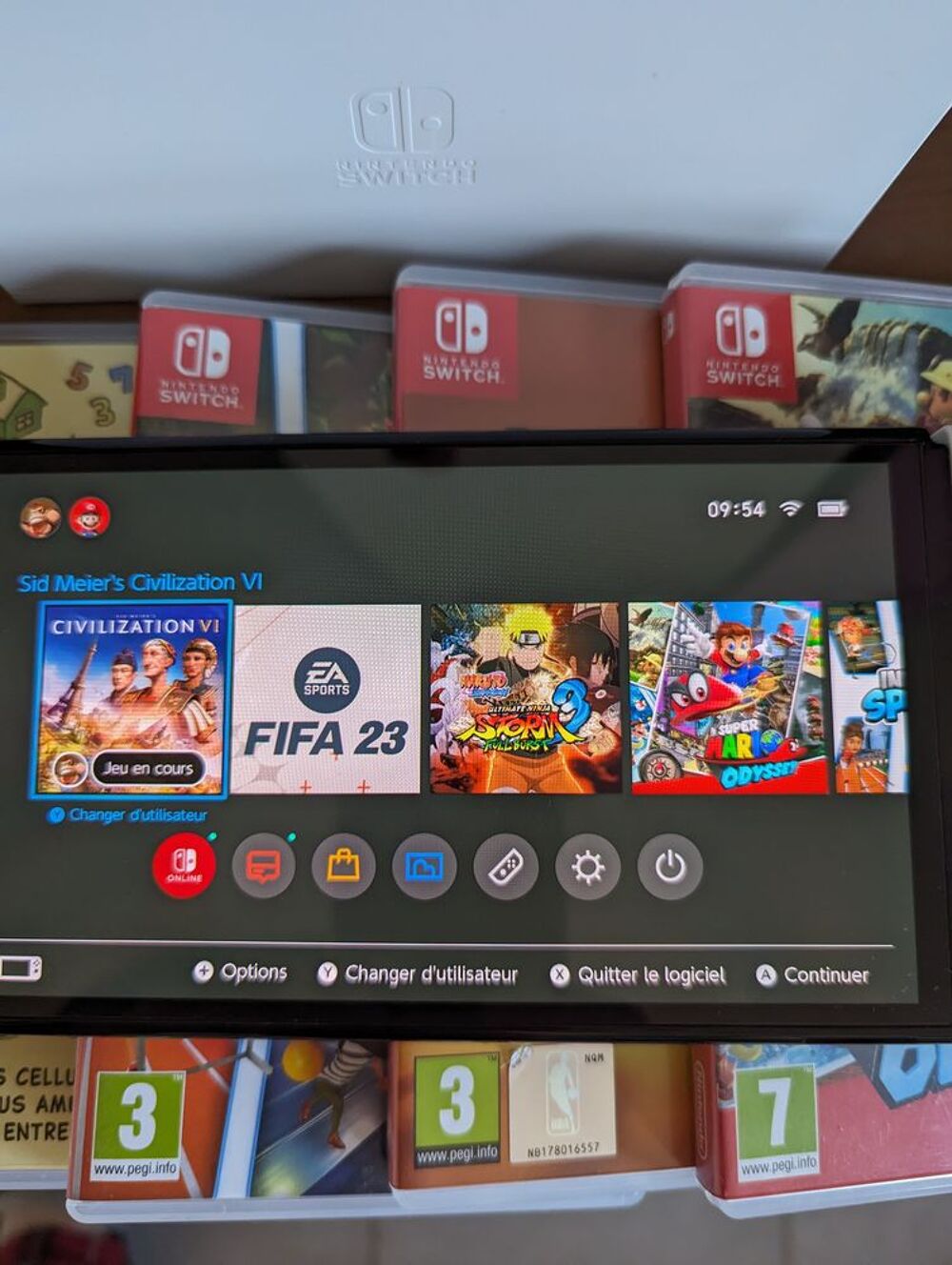 Nintendo Switch OLED + 11 jeux Consoles et jeux vidéos