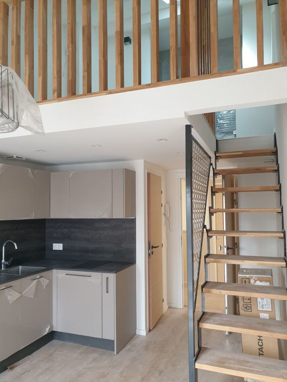 Vente Appartement 2/3 pièces style loft immeuble récent Paris 19