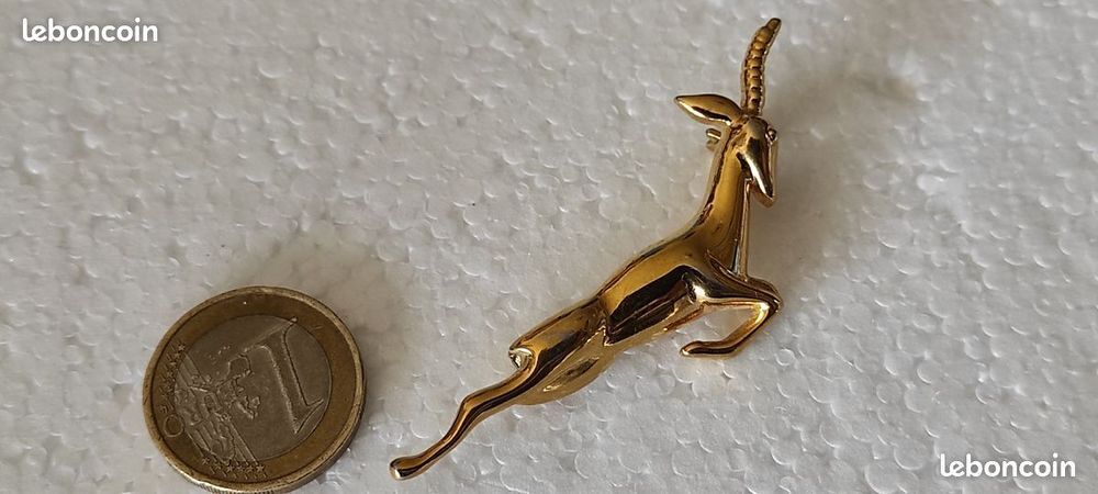 BROCHE ANTILOPE
COULEUR OR Bijoux et montres