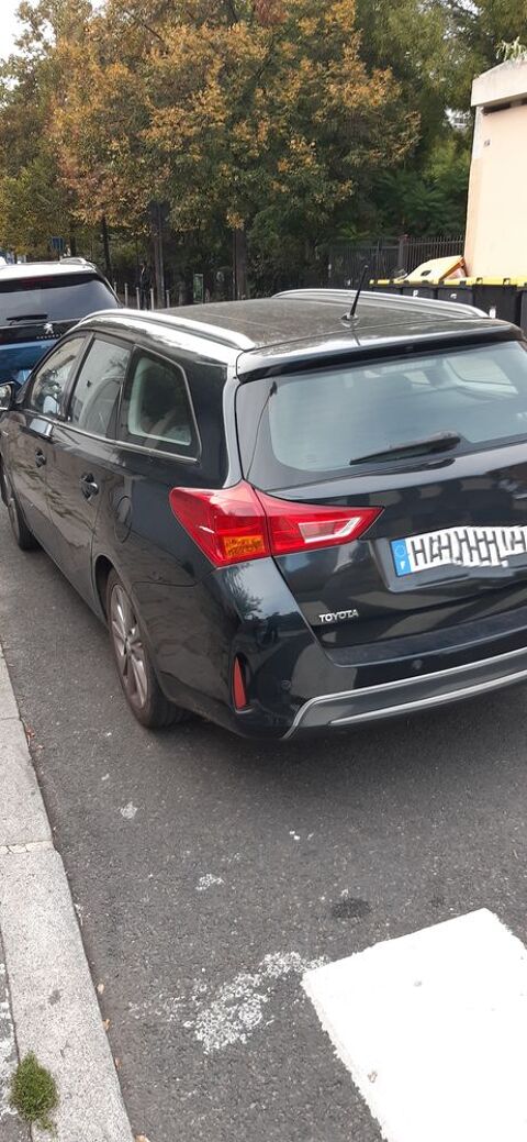 Toyota Auris Touring Sports Hybride 136h Business 2014 occasion Vitry-sur-Seine 94400