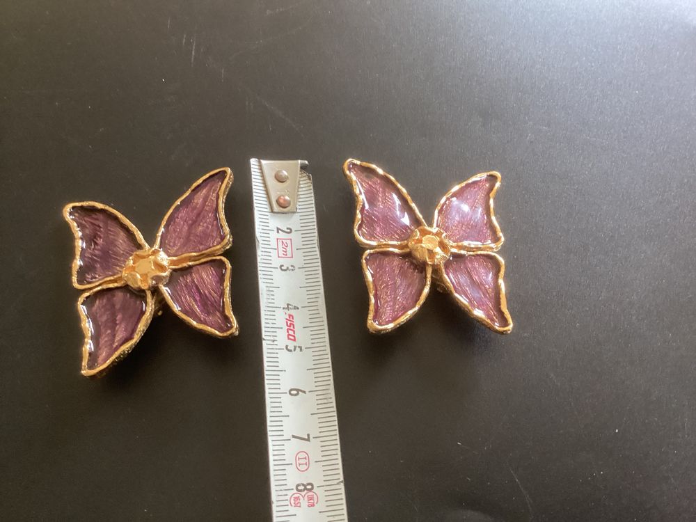 Boucle d'oreille Yves saint Laurent Bijoux et montres