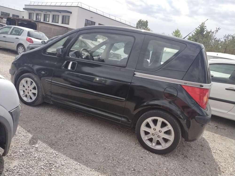 1007 1,4i 75CV E-TRONIC BOITE AUTO 2005 occasion 13510 &Eacute;guilles
