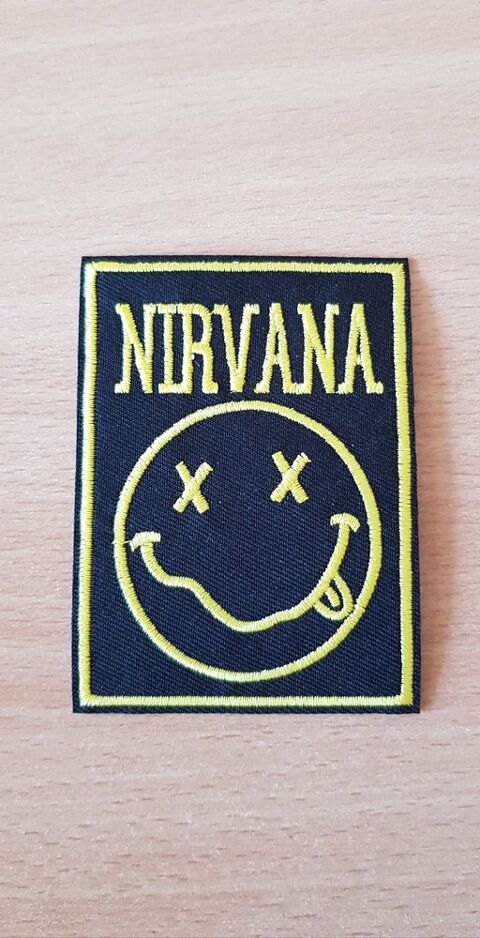 Ecusson brodé 
Logo nirvana 
9,5x7 cm
thermocollant 4 Carnon Plage (34)