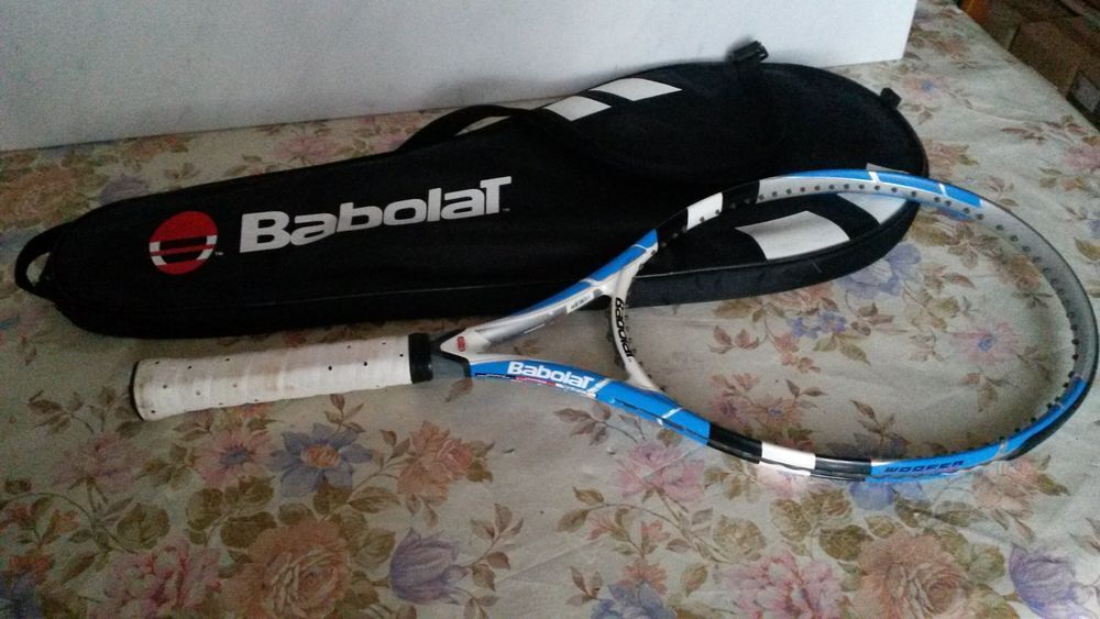 Raquette de; tennis
Sports