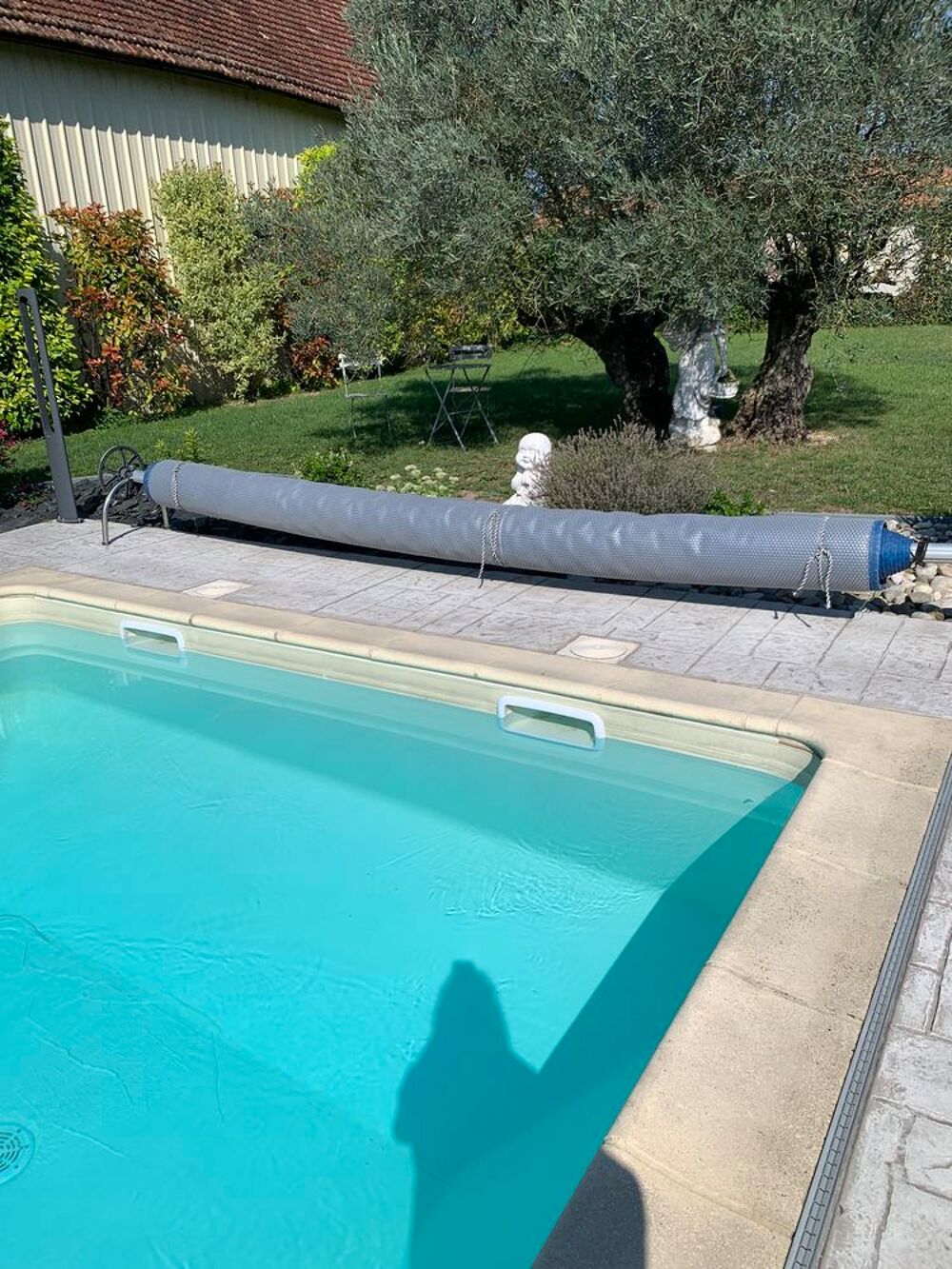 B&acirc;che piscine et enrouleur Jardin