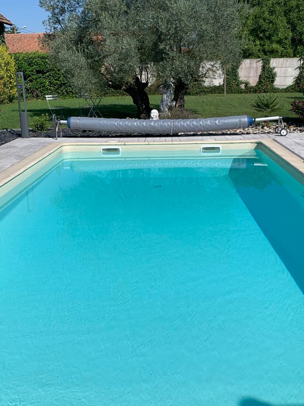 B&acirc;che piscine et enrouleur Jardin