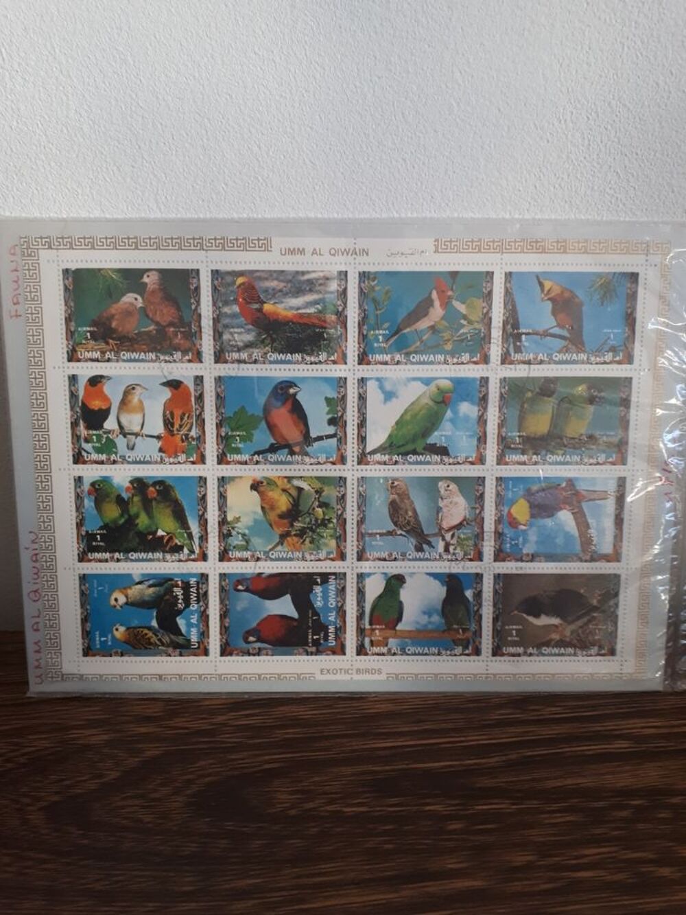 16 timbres neufs Umm al Qiwain oiseaux exotiques 