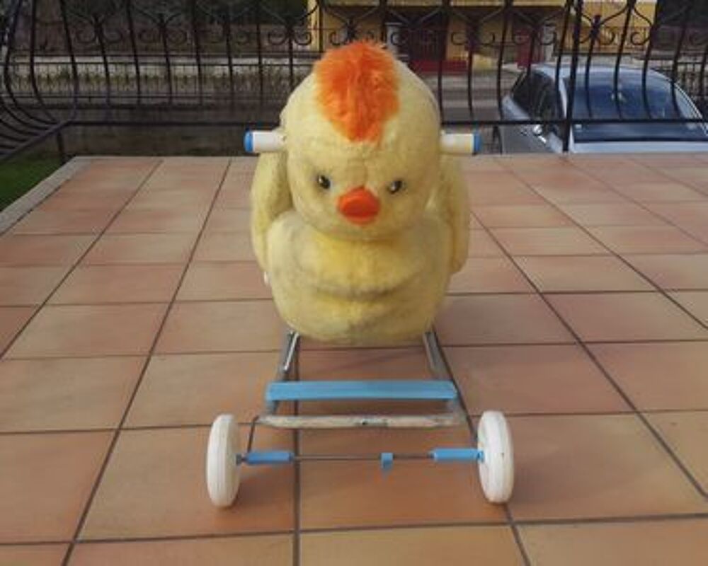 poussin jaune a roulette et bascule Jeux / jouets