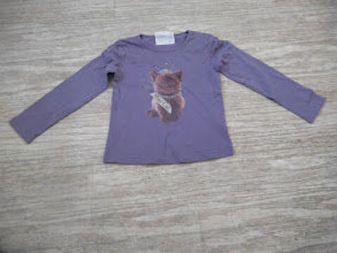 F 9 E (9) - 5 ans -�Tee-Shirt M.L. mauve  N.K.Y.  1 Paris 13 (75)