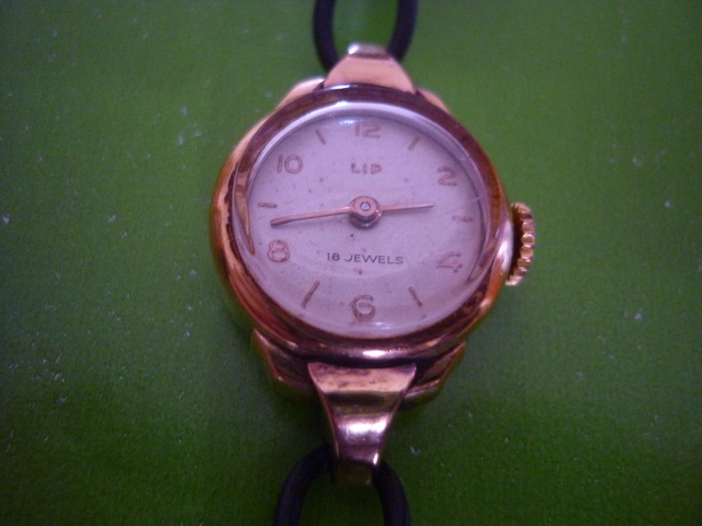 Montre LIP femme PLAQU&Eacute; OR / Lamin&eacute; / 40 MICRONS / 18 Rubis Bijoux et montres