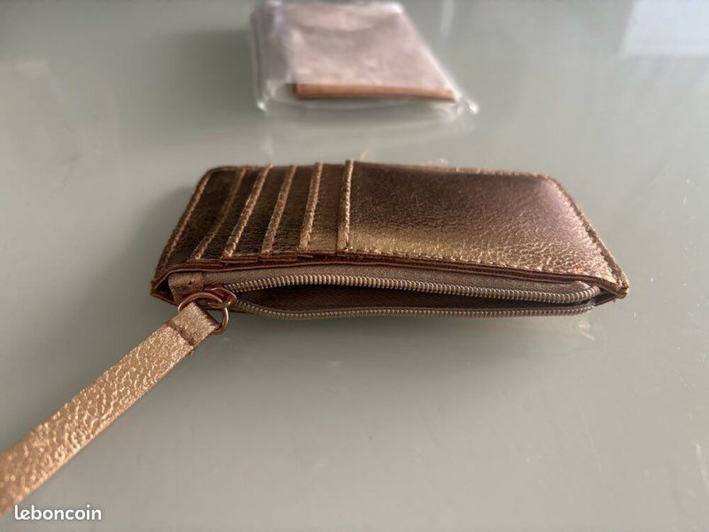 Petit porte-monnaie Guinot neuf sous emballage Bijoux et montres