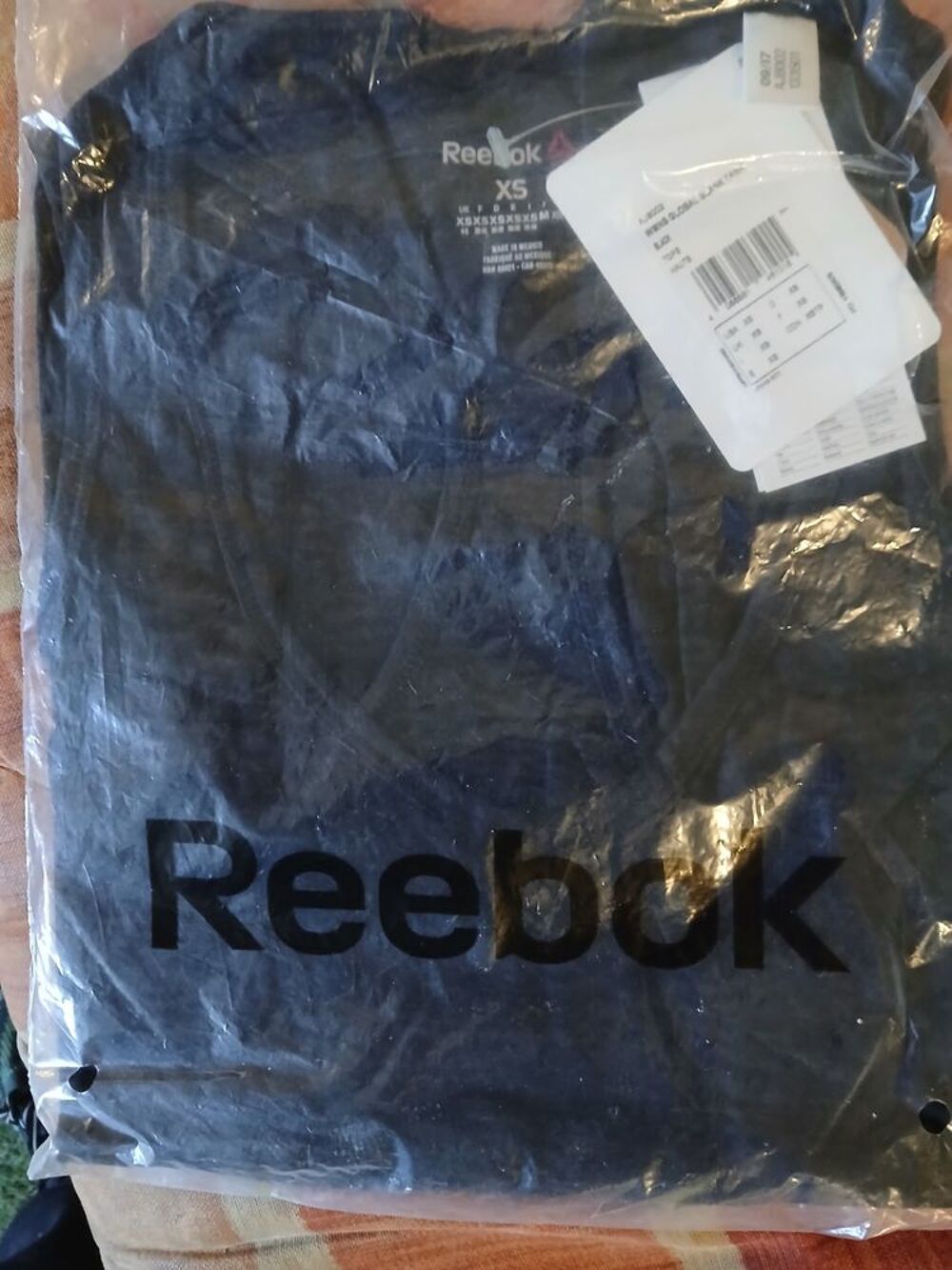 D&eacute;bardeur femme REEBOK blanc ou noir Vêtements