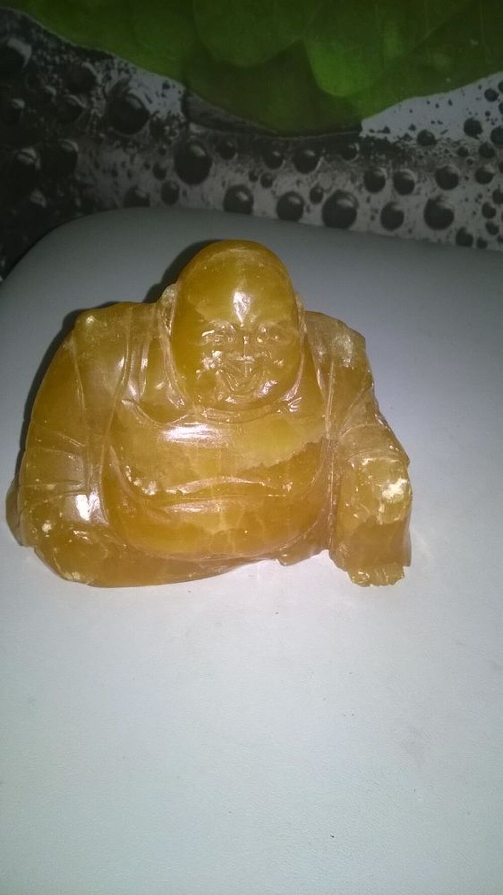 2 bouddha en Onyx et c&eacute;ramique
1/ Onyx 
13 cm de long
10 cm Décoration
