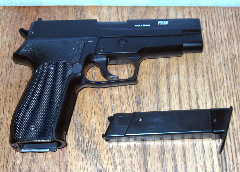 &eacute;change Sig Sauer P226. 