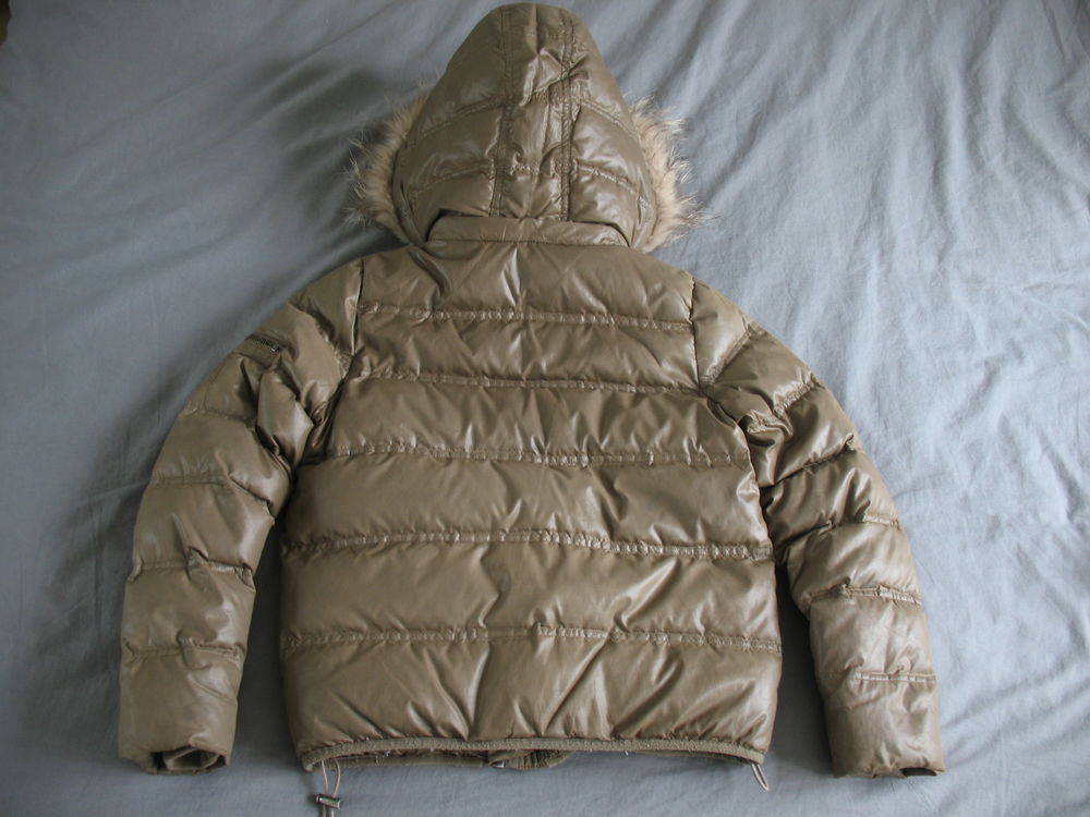 DOUDOUNE BERENICE TAILLE 12 ANS
Vêtements enfants