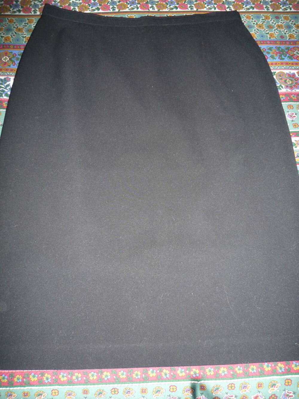 Jupe. 
Vêtements