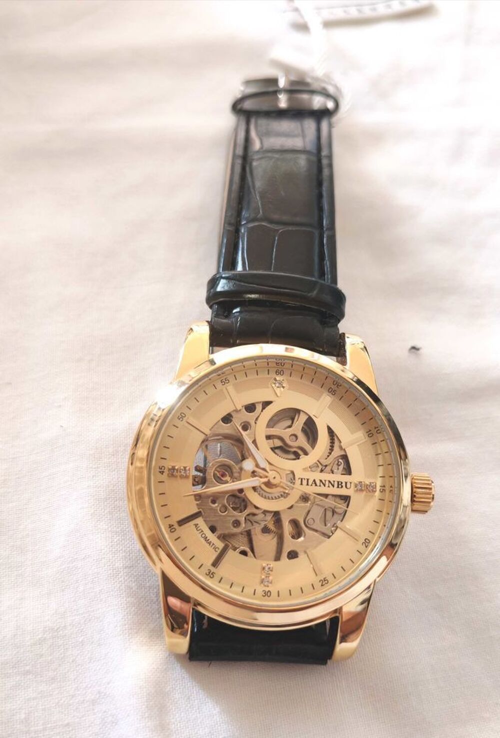 Montre automatique homme TIANNBU €" Squelette dor&eacute;e €" Neuve avec &eacute;tiquette Bijoux et montres
