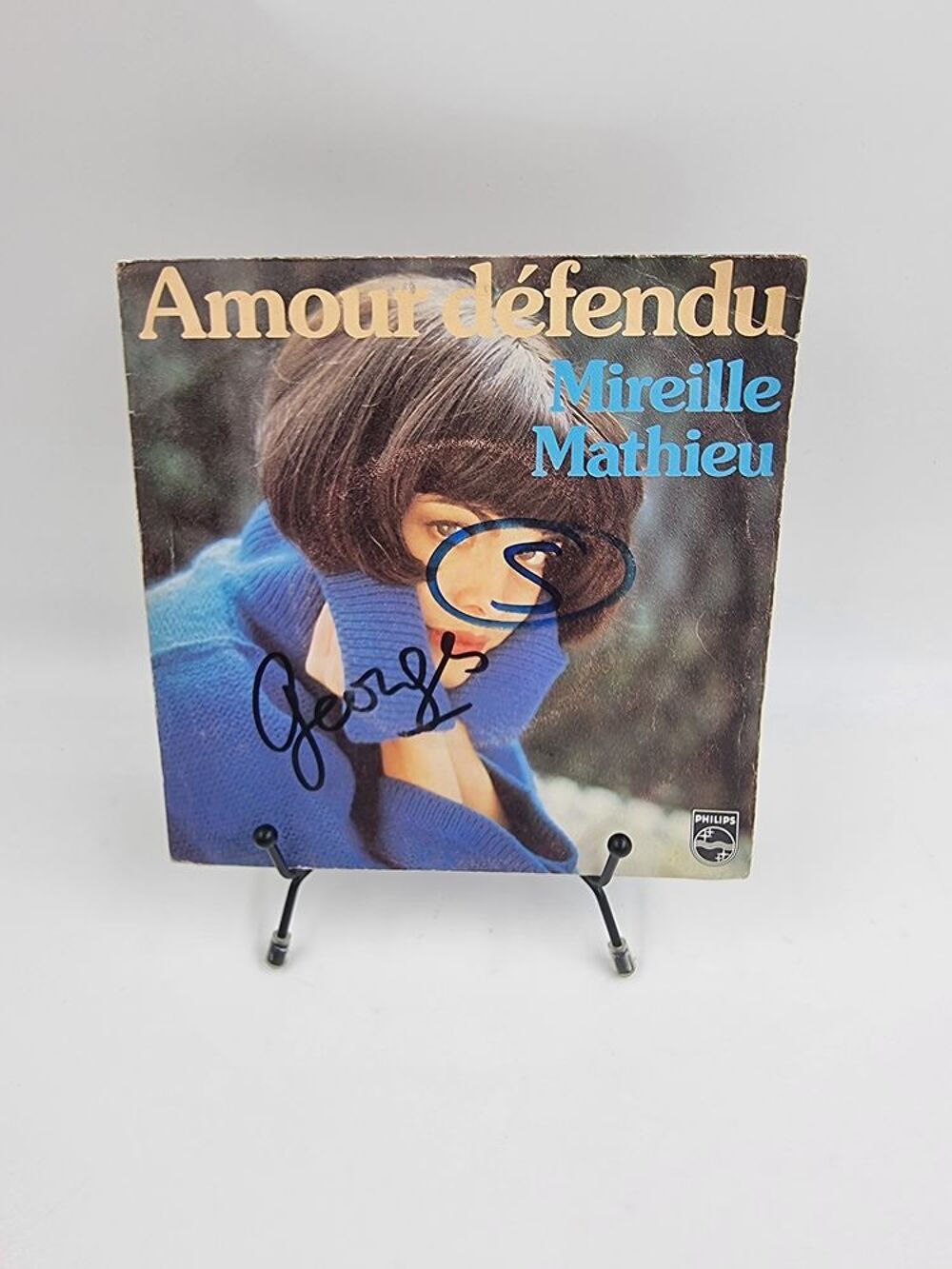 Vinyle 45 tours Mireille Mathieu : Amour D&eacute;fendu avec fourre CD et vinyles