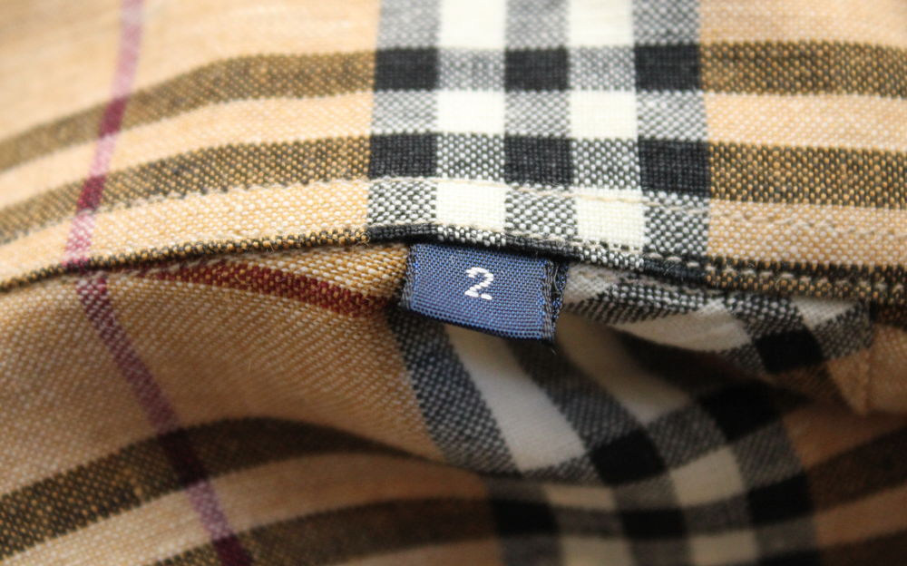 Chemise tartan BURBERRY T.2.
Vêtements